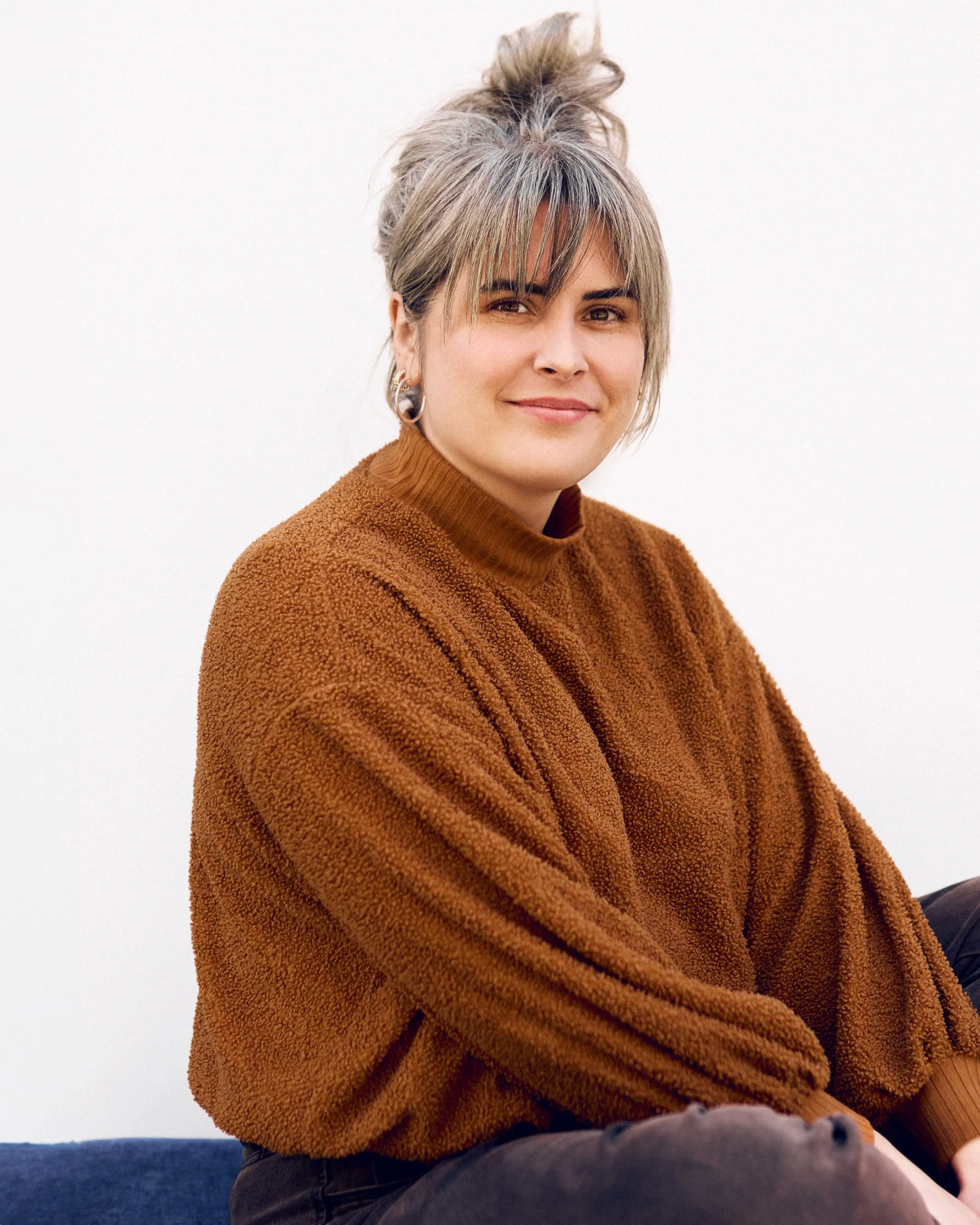Sarah, who moved from Member Experience to AI Operations Enablement at Kindred.